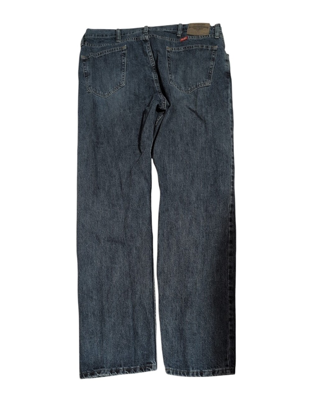 Wrangler men's relaxed fit jeans in a dark blue wash. Classic 5-pocket styling
